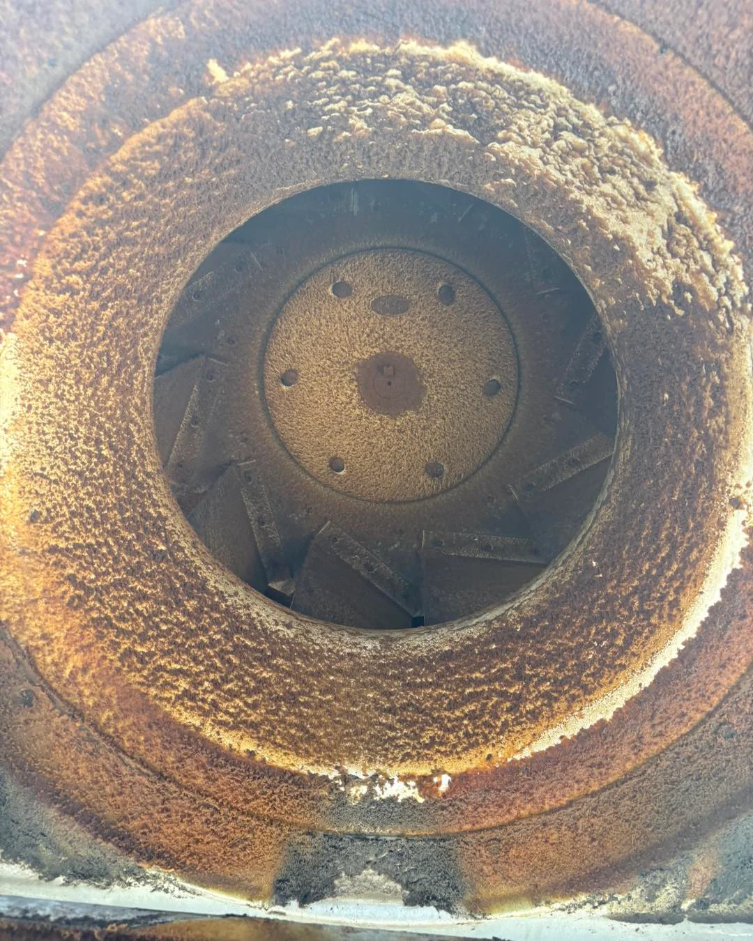 Exhaust fan coated in grease before cleaning