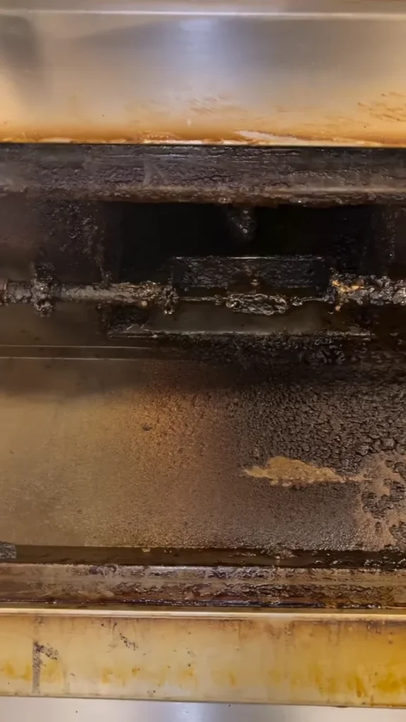 Grease-caked kitchen hood plenum