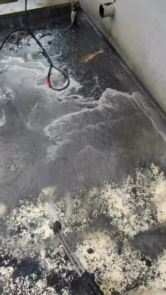 Grease-stained restaurant roof around an exhaust fan
